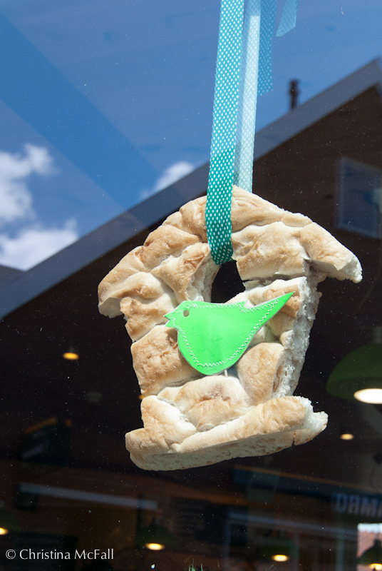 bread birdhouse decoration in bakery window in Zaandijk the Netherlands
